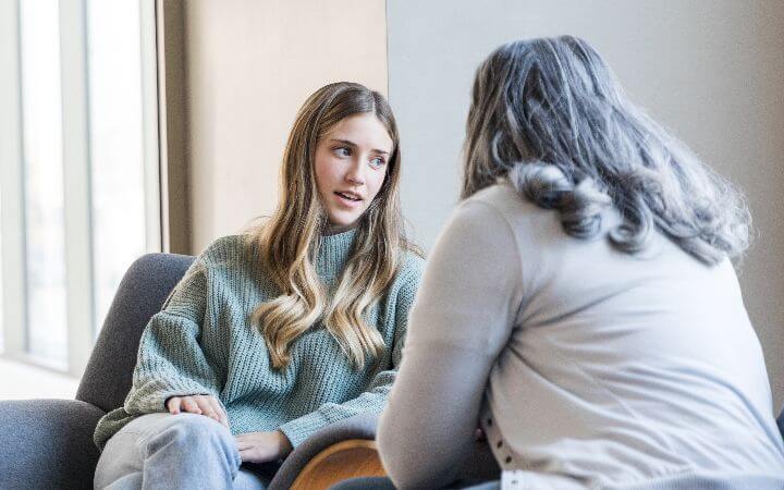 Two women talking